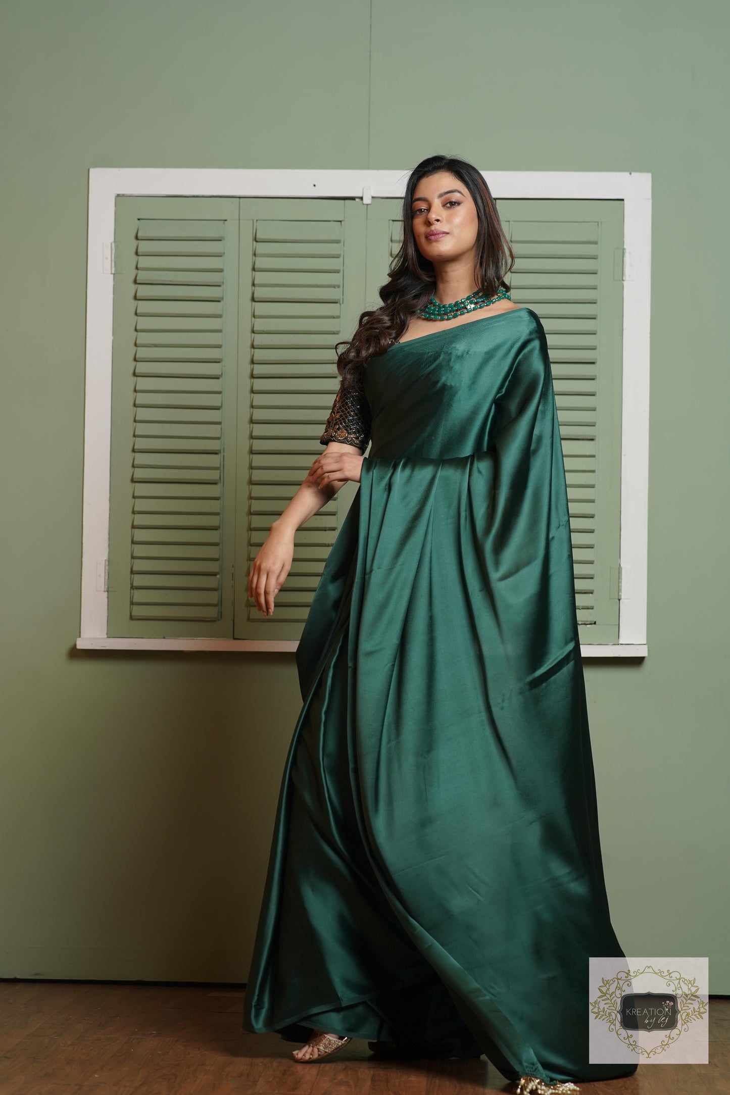Emerald Green Satin Silk Saree With Handmade Tassels On Pallu