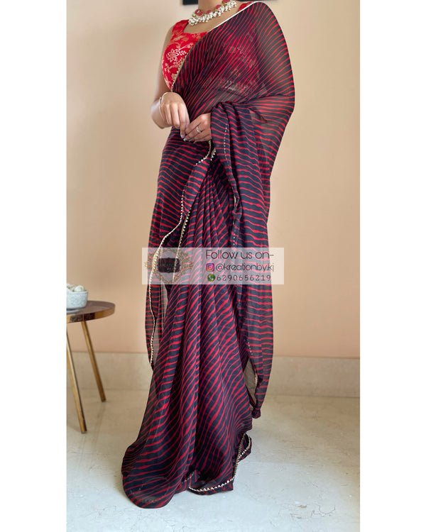 Deep Green Sequence Embroidery Leheriya Georgette Saree main image 0