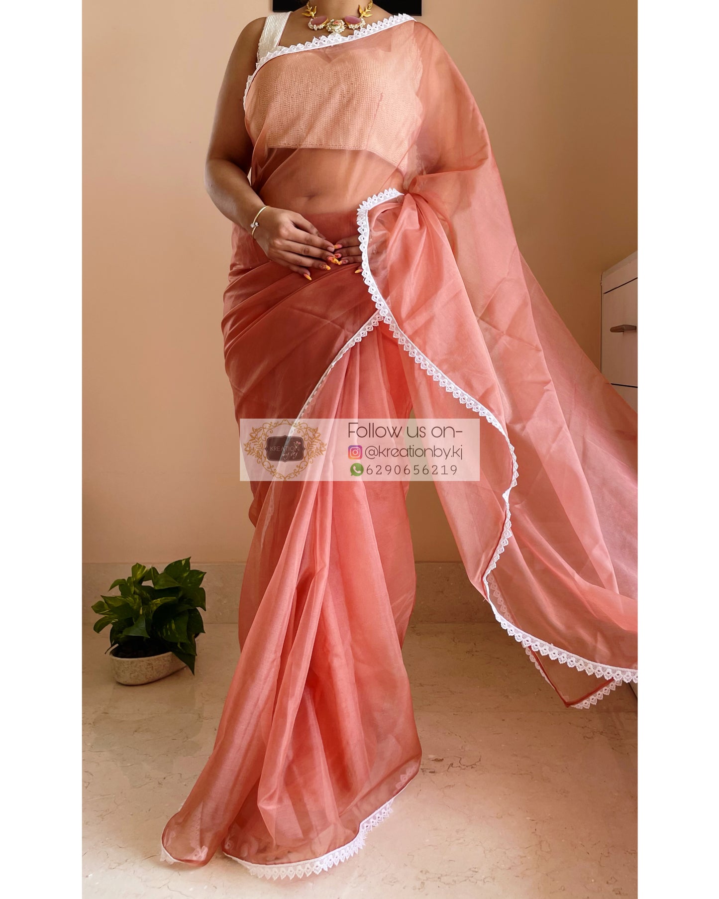 Rust Organza Saree with Pearl Blouse Piece