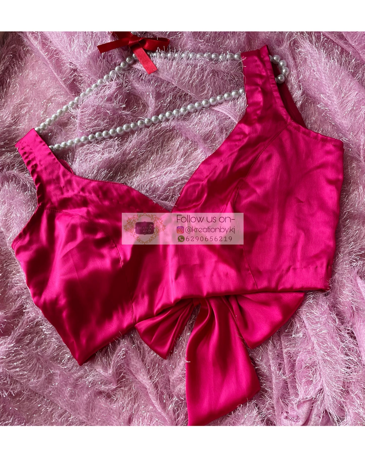 Hot Pink Sleeveless Blouse