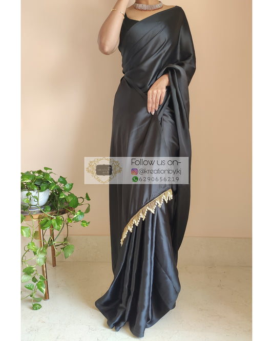 Black Satin Silk Saree With Handmade Tassels On Pallu - kreationbykj